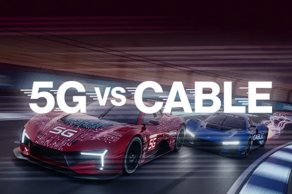 Two race cars, one representing "5G" and the other "CABLE," speeding around a track with motion blur to symbolize a comparison of internet speeds.